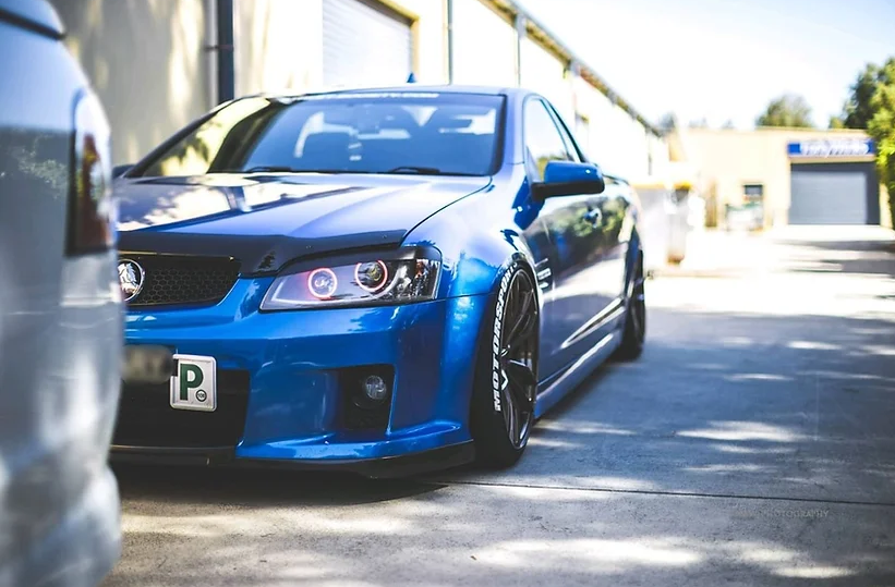 Holden VE Commodore S1/S2 DRL Style Headlights with Multicoloured Halo Rings and Demon Eyes - Dan's Custom Car Lights