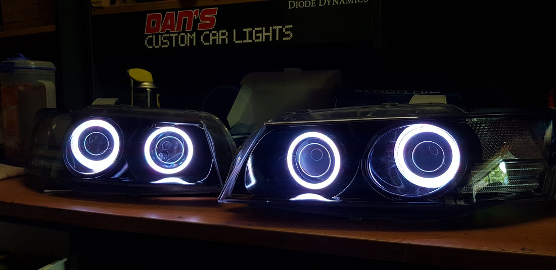Holden VZ Commodore fitted with Quad Projectors and Multicolored Halo Ring - Dan's Custom Car Lights