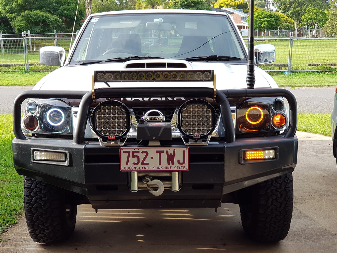 Nissan Navara D22 Headlights with White/Amber Halo Rings - Dan's Custom Car Lights