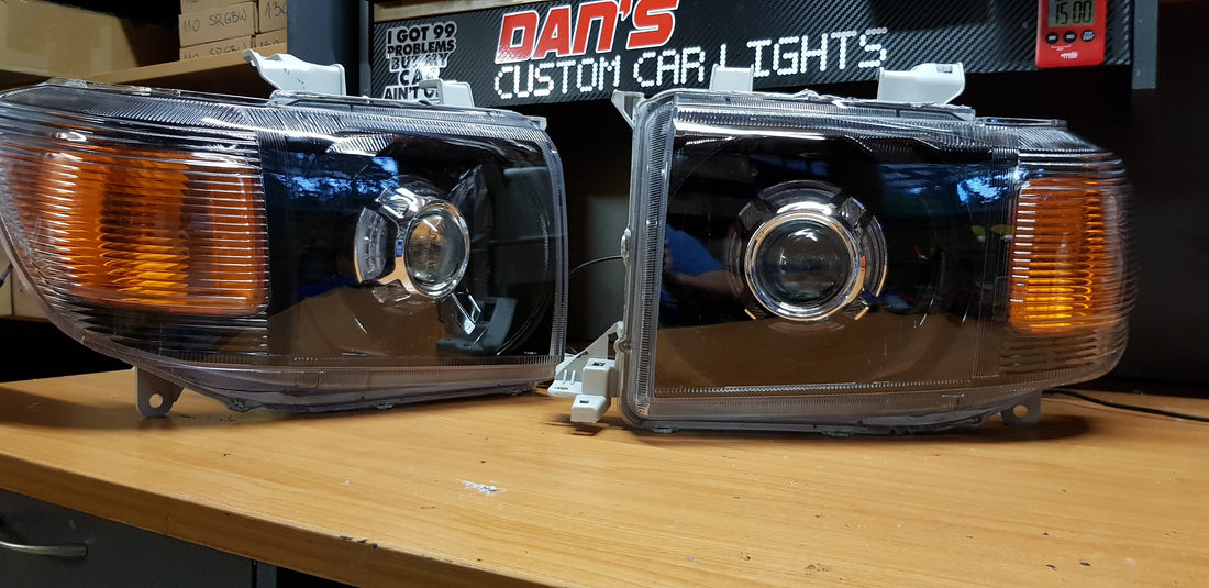 Toyota Landcruiser 76 77 78 and 79 series Headlights w/ Panamera Shrouds - Dan's Custom Car Lights