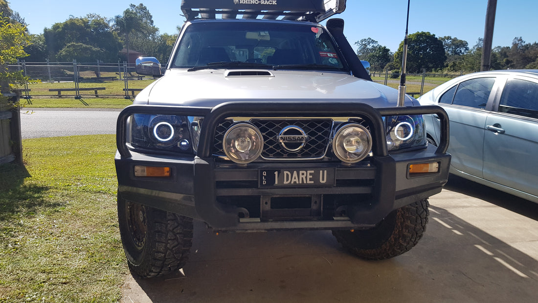 Nissan Patrol GU S4 Headlights with White/Amber Halo Rings and Projectors - Dan's Custom Car Lights