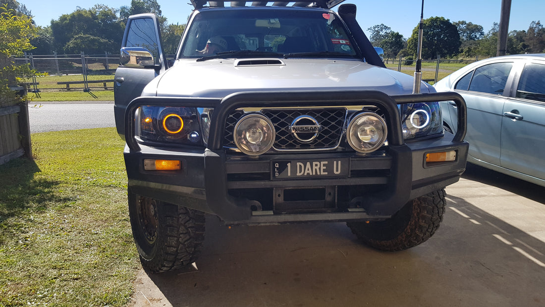 Nissan Patrol GU S4 Headlights with White/Amber Halo Rings and Projectors - Dan's Custom Car Lights