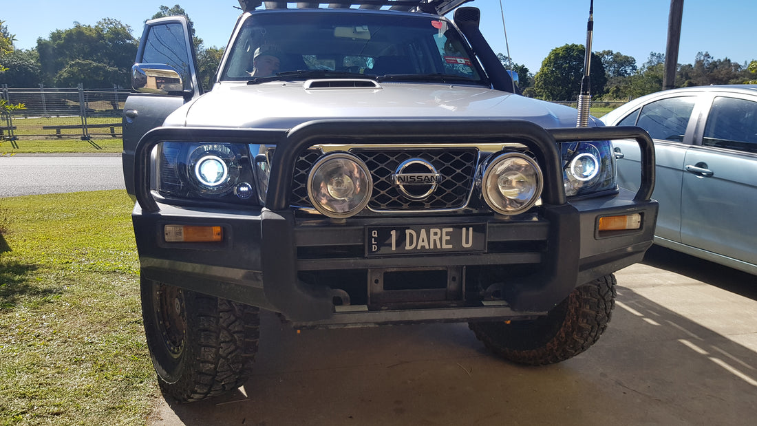 Nissan Patrol GU S4 Headlights with White/Amber Halo Rings and Projectors - Dan's Custom Car Lights