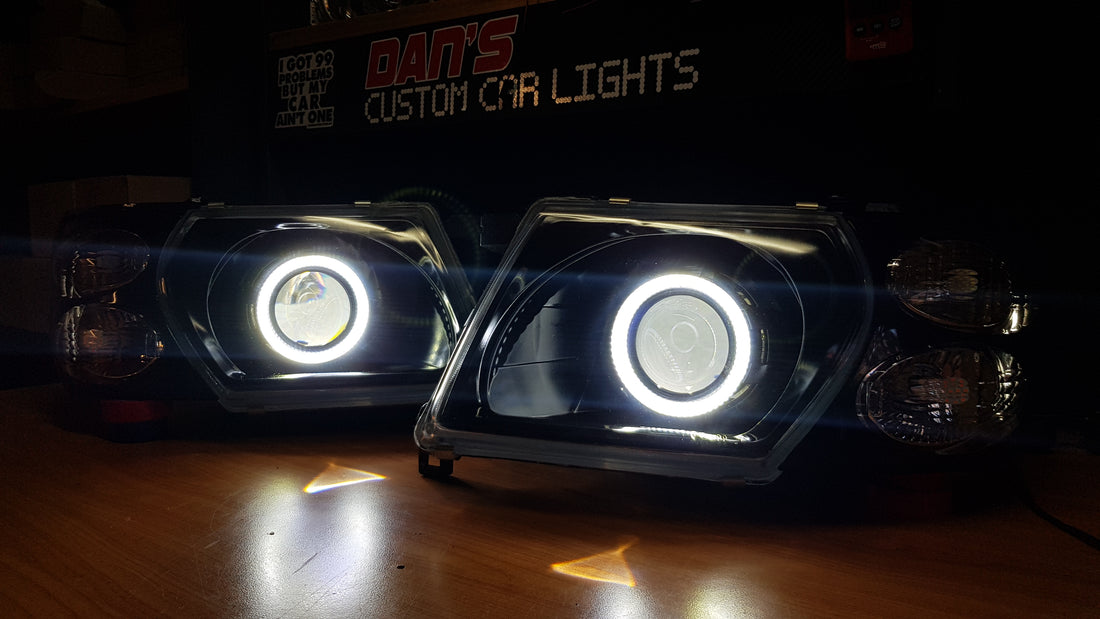 Nissan Patrol GU S1-S3 Headlights with Switchback White/Amber Halorings and RGB Demon eyes - Dan's Custom Car Lights