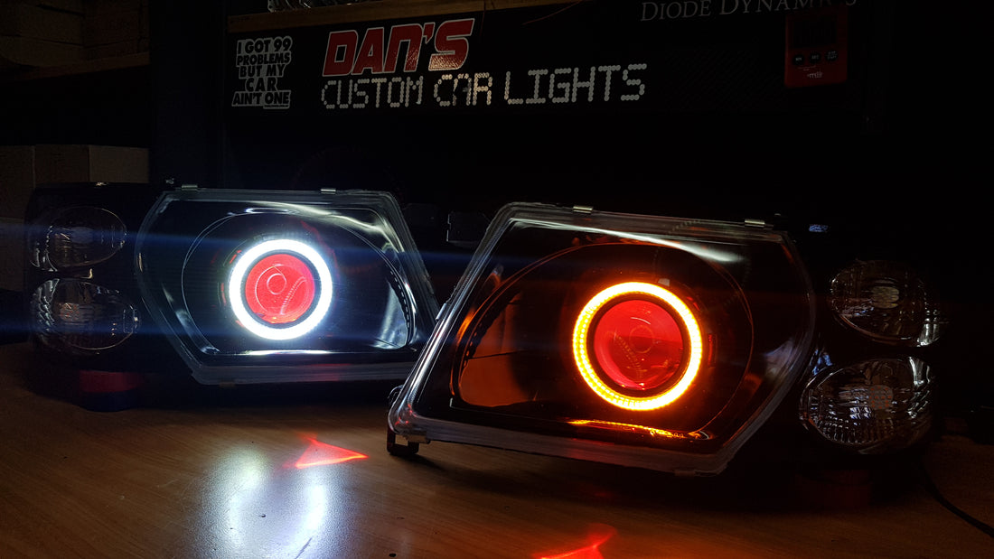 Nissan Patrol GU S1-S3 Headlights with Switchback White/Amber Halorings and RGB Demon eyes - Dan's Custom Car Lights