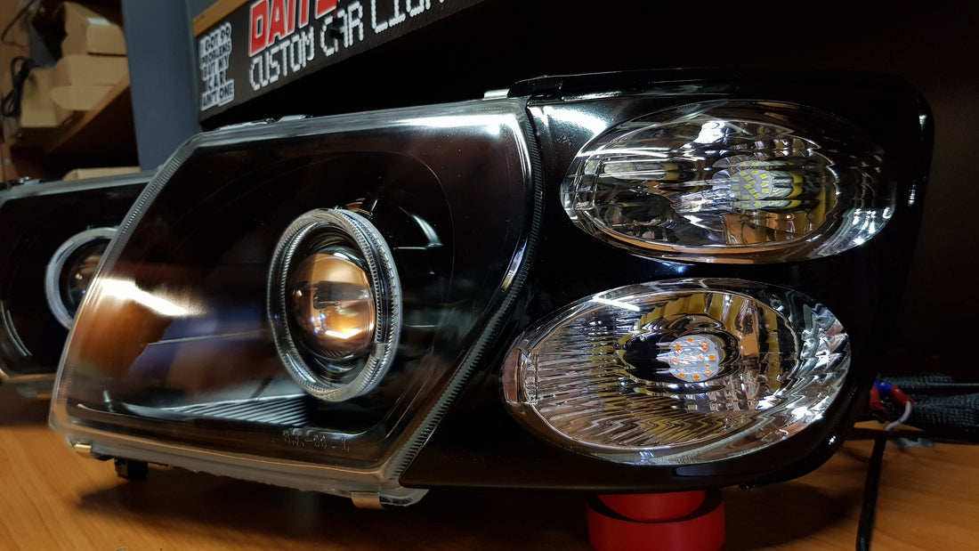 Nissan Patrol GU S1-S3 Headlights with Switchback White/Amber Halorings and RGB Demon eyes - Dan's Custom Car Lights