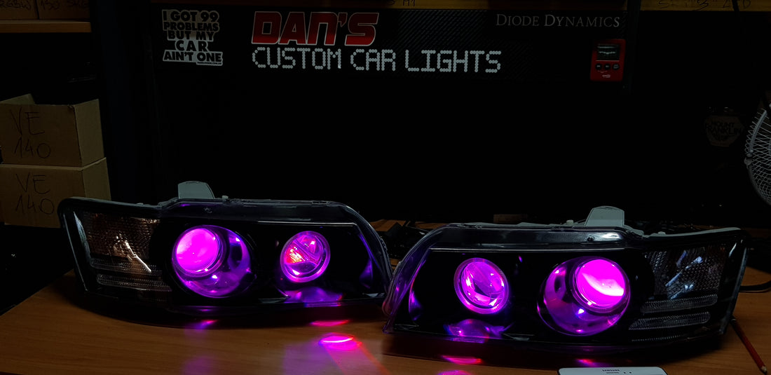 Holden VZ Commodore Projector Headlights with Multicolored Halo Rings and Demon Eyes - Dan's Custom Car Lights
