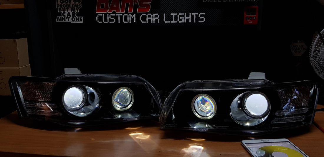 Holden VZ Commodore Projector Headlights with Multicolored Halo Rings and Demon Eyes - Dan's Custom Car Lights