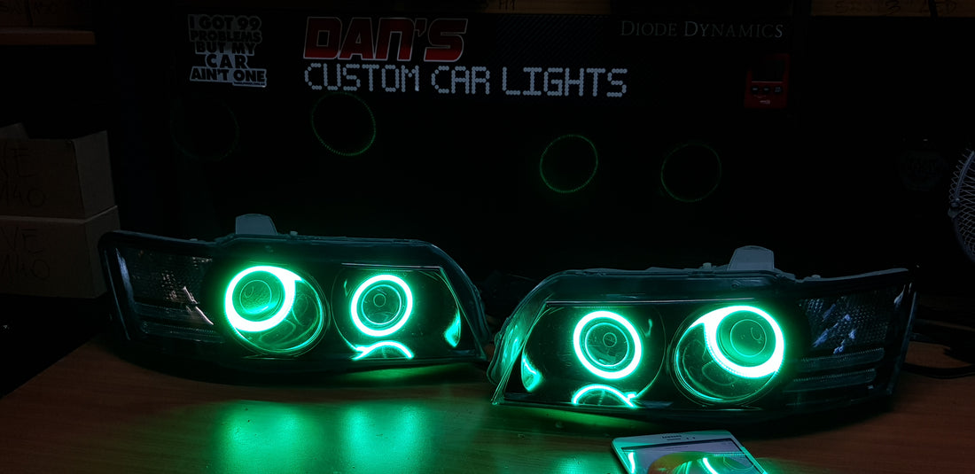 Holden VZ Commodore Projector Headlights with Multicolored Halo Rings and Demon Eyes - Dan's Custom Car Lights