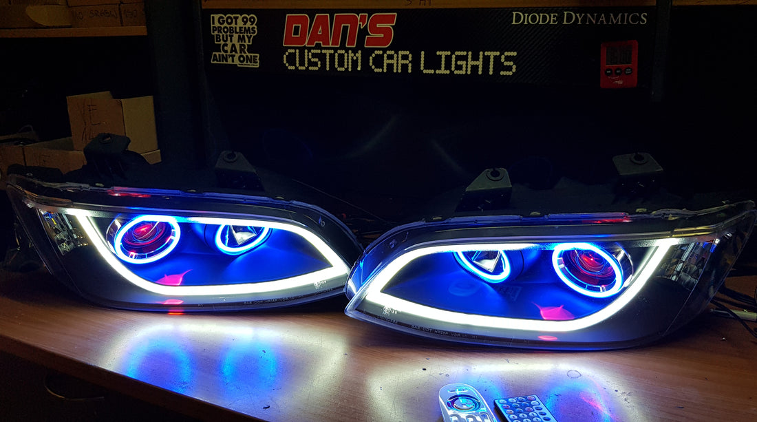 Holden VE Commodore S1/S2 DRL Style Headlights with Multicoloured Halo Rings and Demon Eyes - Dan's Custom Car Lights