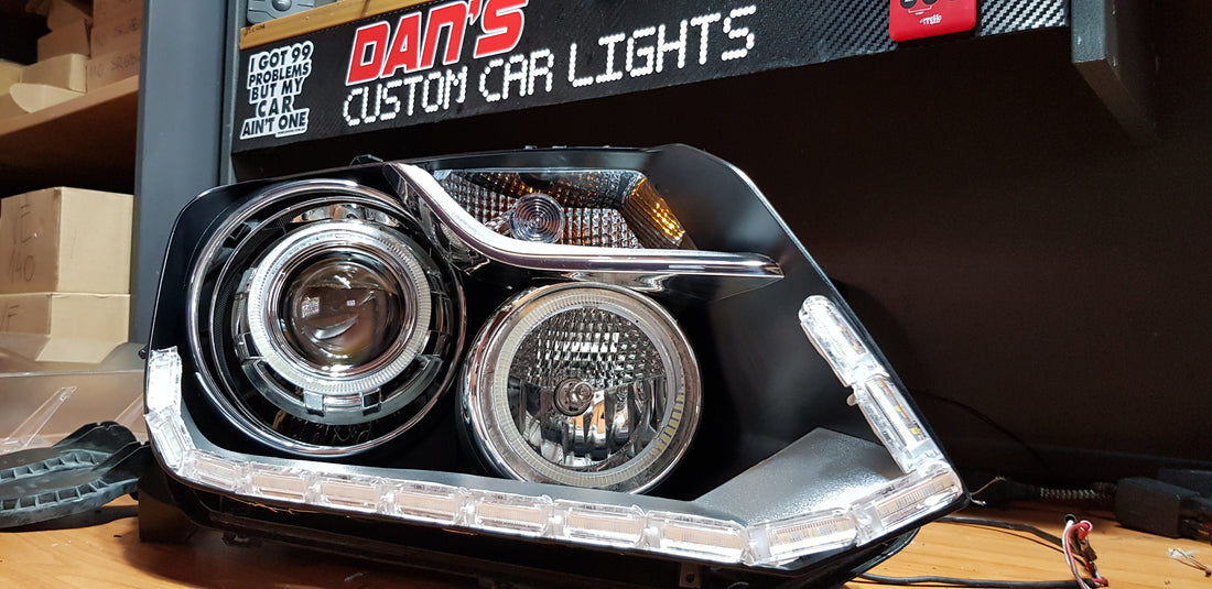 Volkswagen VW Amarok 2010-2022 Headlights with Low Beam LED Projectors, Switchback White/Amber LED Halo rings, and Sequential DRL - Dan's Custom Car Lights