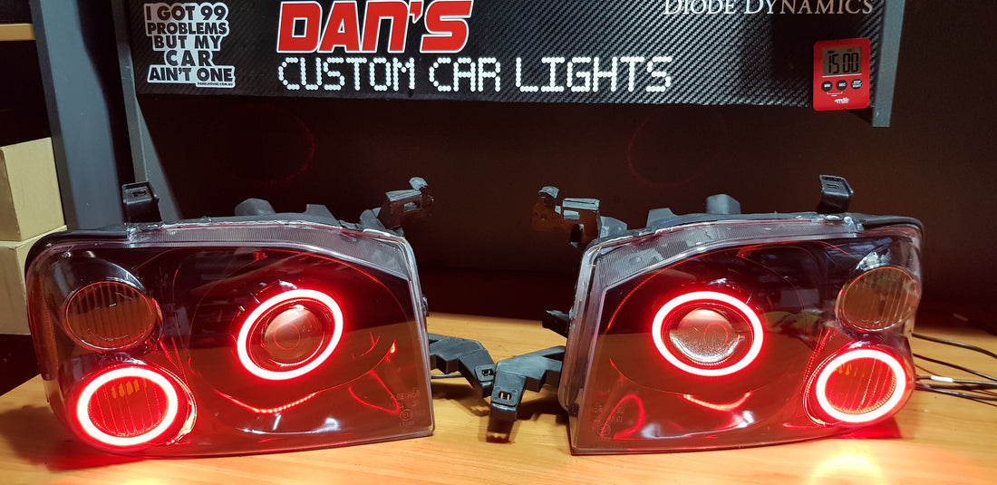Nissan Navarra D22 Headlights with Quad Multicoloured Halo Rings - Dan's Custom Car Lights
