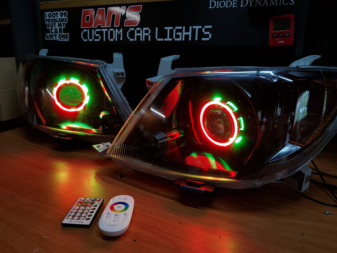 Toyota Hilux 2005 -2015 with Projectors and Dual Multicoloured Halo Rings - Dan's Custom Car Lights