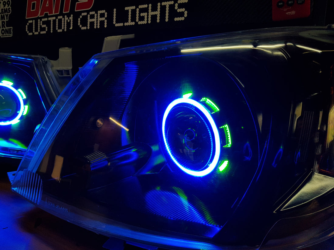 Toyota Hilux 2005 -2015 with Projectors and Dual Multicoloured Halo Rings - Dan's Custom Car Lights