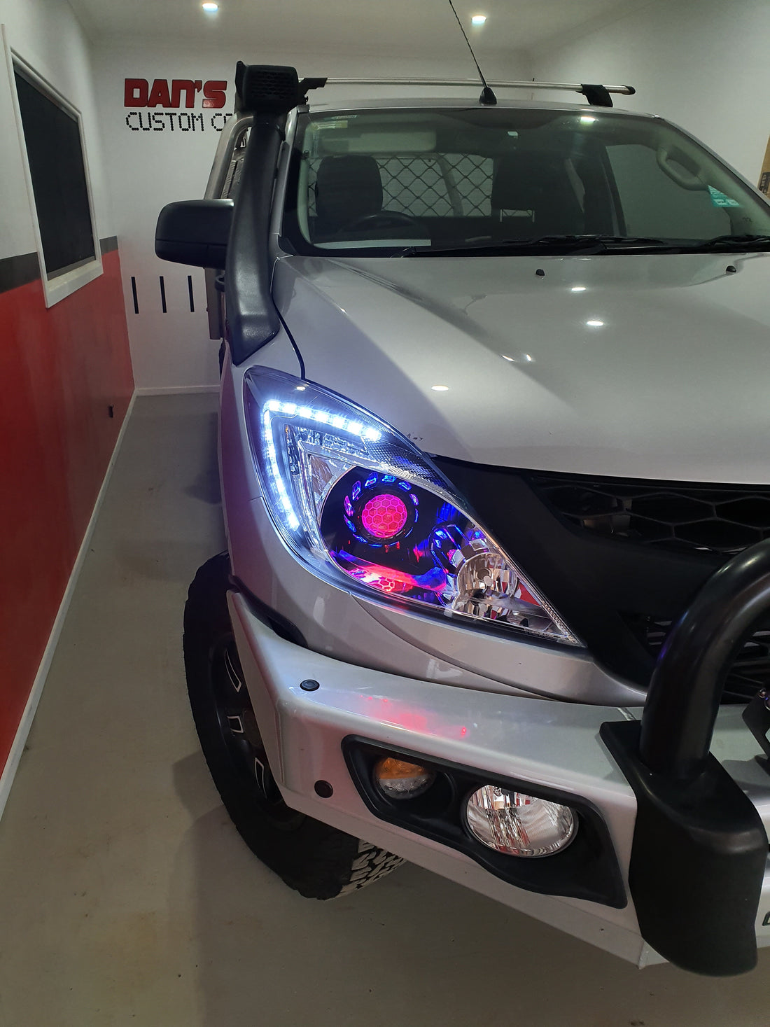 Mazda BT 50 UP 2011-2015 with Turbineshroud Multicolored Halo Rings, Demon Eyes & Honeycomb Lens Etching - Dan's Custom Car Lights