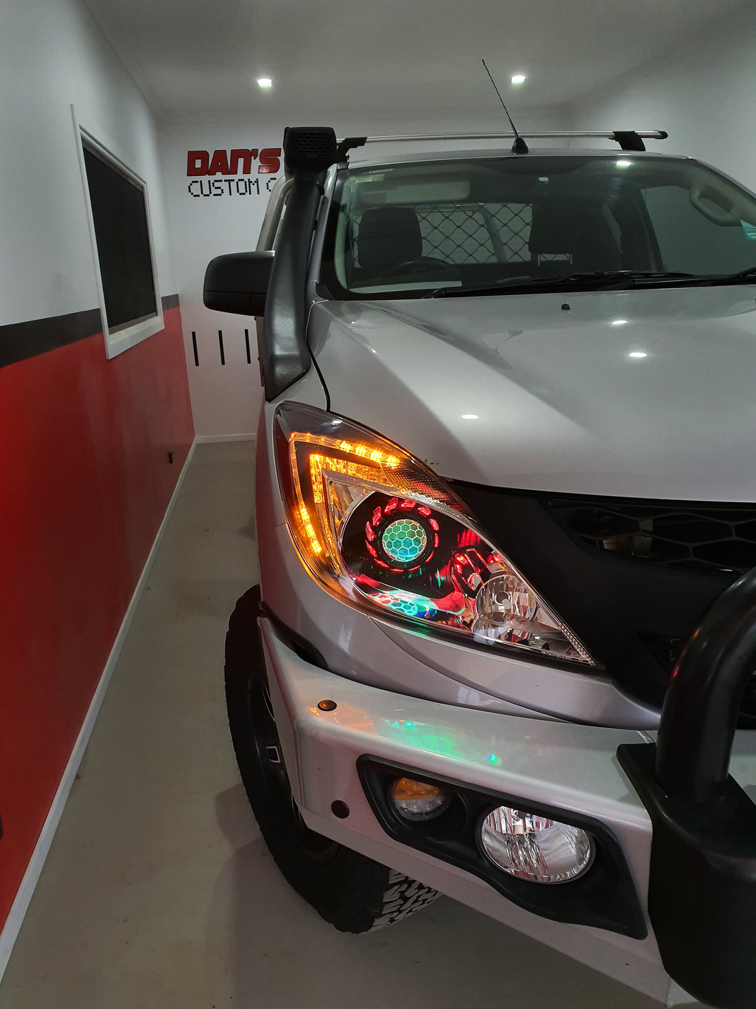 Mazda BT 50 UP 2011-2015 with Turbineshroud Multicolored Halo Rings, Demon Eyes & Honeycomb Lens Etching - Dan's Custom Car Lights