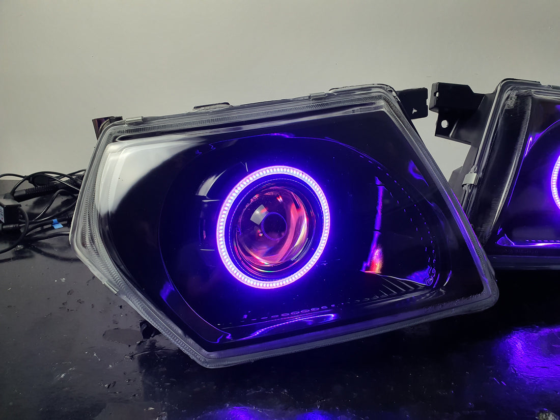 Nissan Patrol GU S1-S3 Headlights with Multicolored Halo Rings and Demon Eyes - Dan's Custom Car Lights