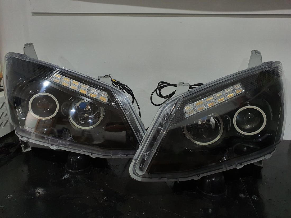 Isuzu DMAX 2012-2015 Projector Headlights with Multicolored Halo rings, Switchback sequential DRLS, and Blacking out - Dan's Custom Car Lights