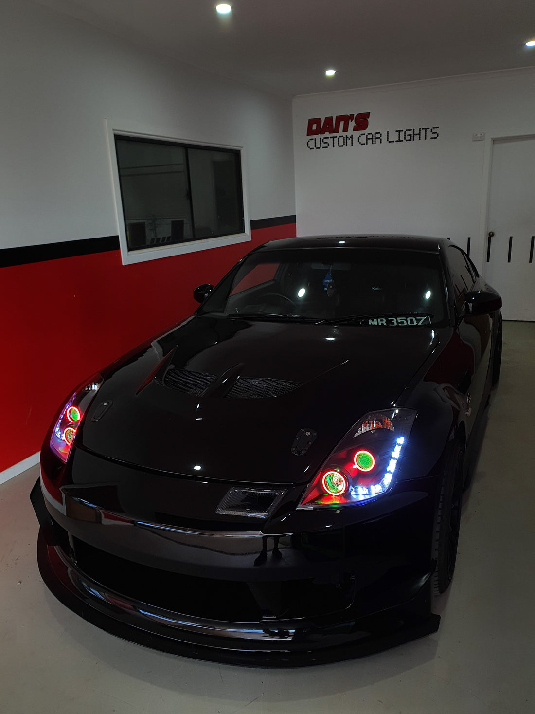 Nissan 350Z Headlights with Multicoloured Halo Rings, Demon Eyes and "Honeycomb" Projector Lens Etching - Dan's Custom Car Lights