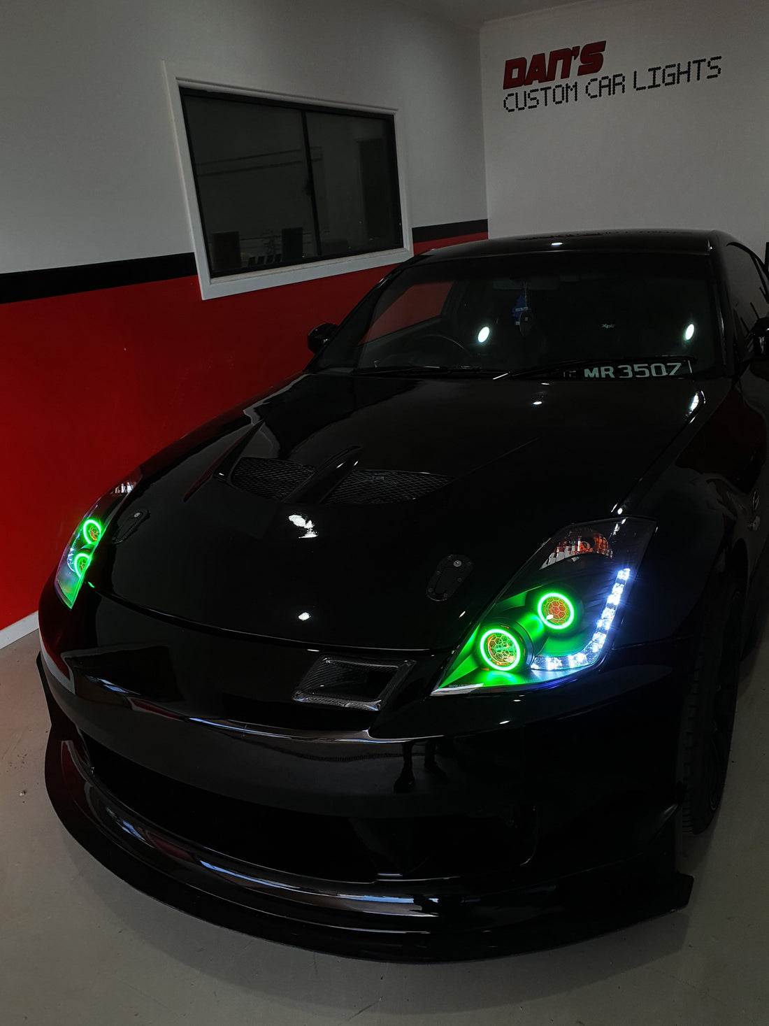 Nissan 350Z Headlights with Multicoloured Halo Rings, Demon Eyes and "Honeycomb" Projector Lens Etching - Dan's Custom Car Lights