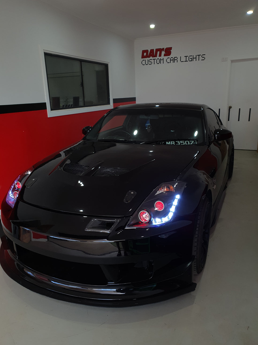 Nissan 350Z Headlights with Multicoloured Halo Rings, Demon Eyes and "Honeycomb" Projector Lens Etching - Dan's Custom Car Lights