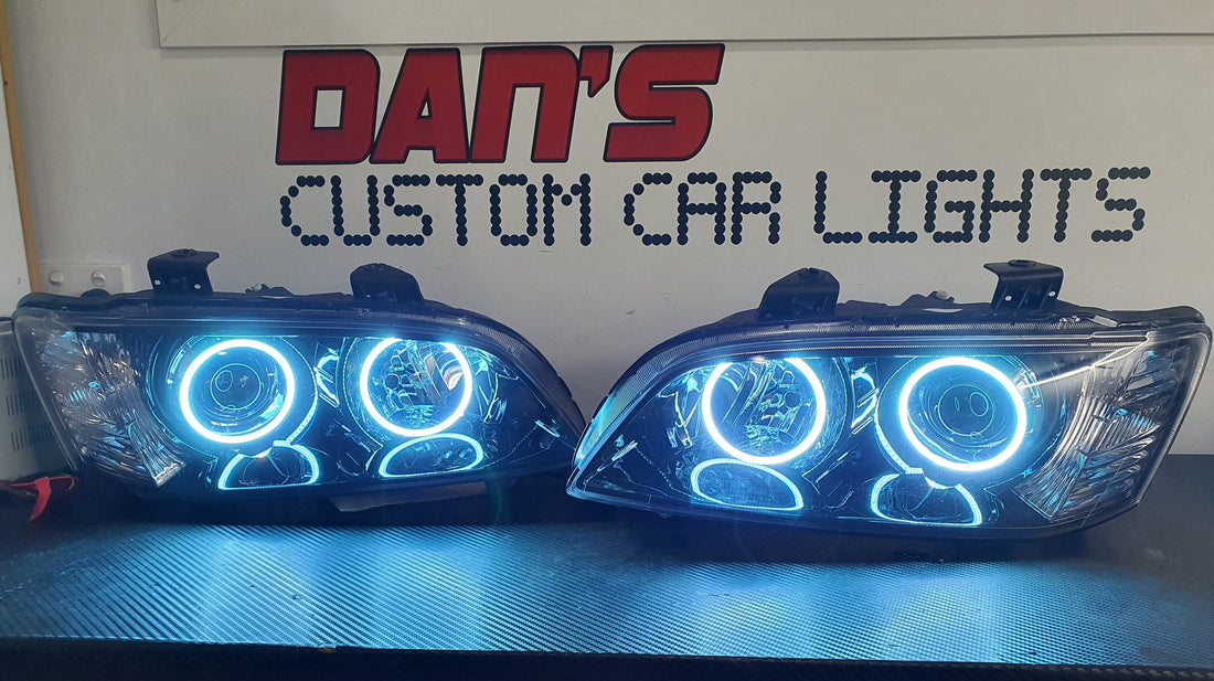 Holden VE Commodore S1 Projector Headlights with Multicoloured Halo Rings - Dan's Custom Car Lights