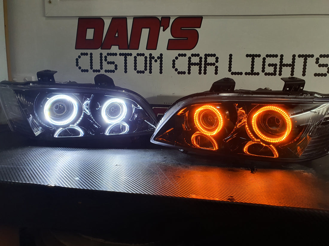 Holden VE Commodore S1 with Quad Projectors and White/Amber Halorings - Dan's Custom Car Lights