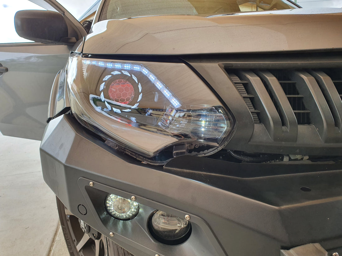 Mitsubishi Triton MQ 2015-2018 Headlights fitted with Turbine Bi Projectors, Switchback LED DRL, White/Amber Halo Rings, Multicolored Demon Eyes, Honeycomb Etching, & Blacking out - Dan's Custom Car Lights