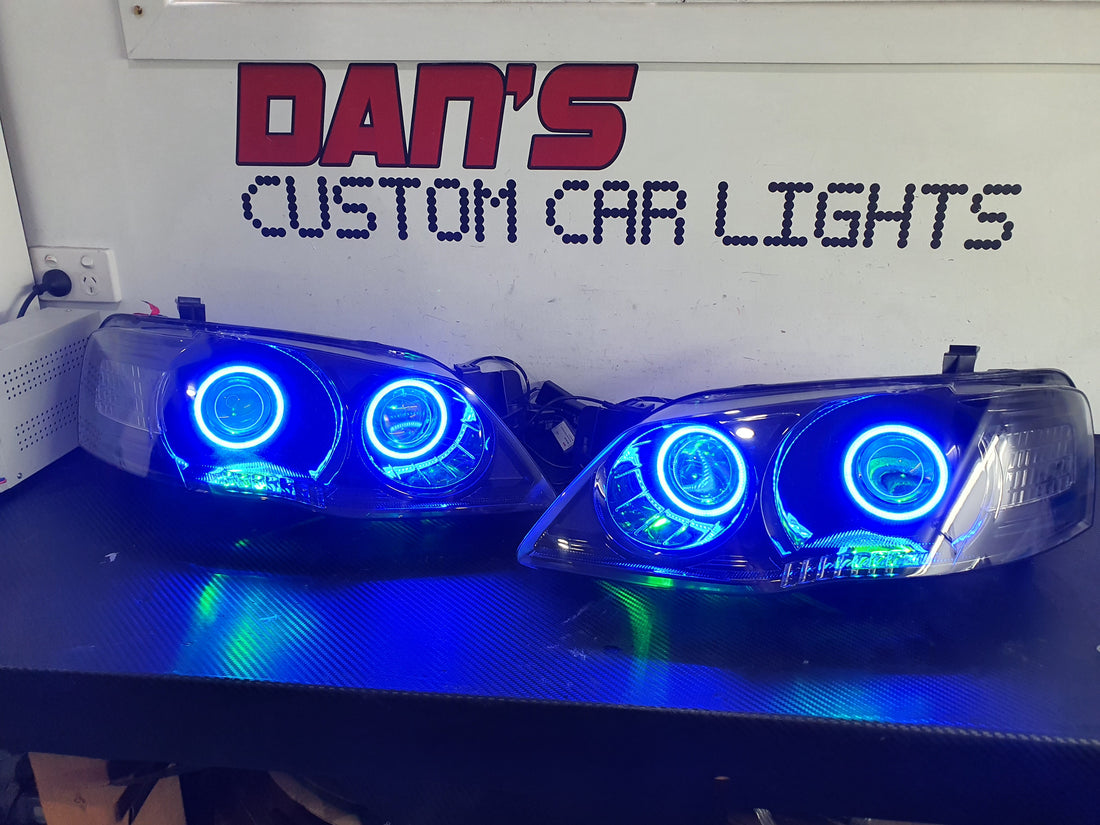 Ford Falcon BF MK2 with Quad Projectors, Quad Multicolored Halo Rings and  Multicolored Demon Eyes - Dan's Custom Car Lights
