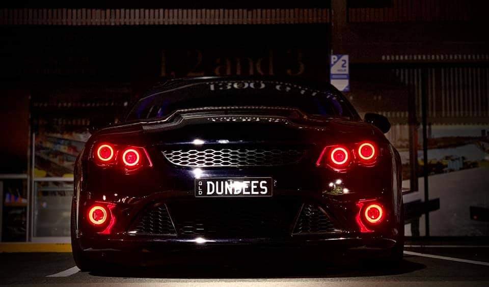 Ford Falcon XR6/XR8 Headlights Fully Blacked out, Quad Projectors, Multicolored Halo Rings and matching Fog Lights - Dan's Custom Car Lights