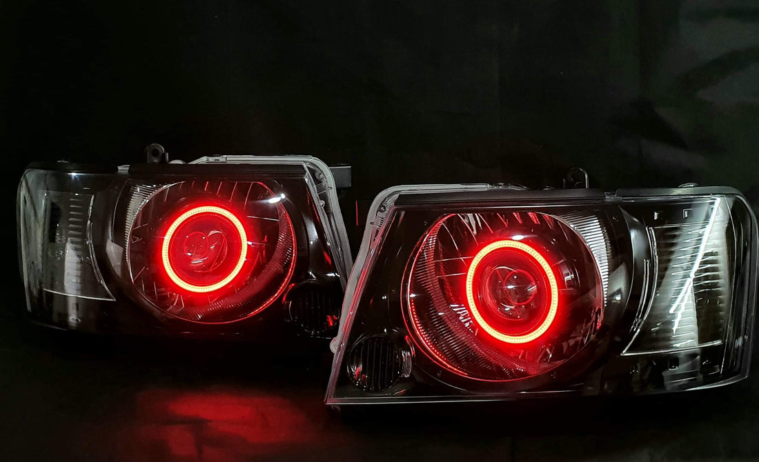 Nissan Patrol GU S4 Headlights with Multicoloured Halo Rings & Projector - Dan's Custom Car Lights