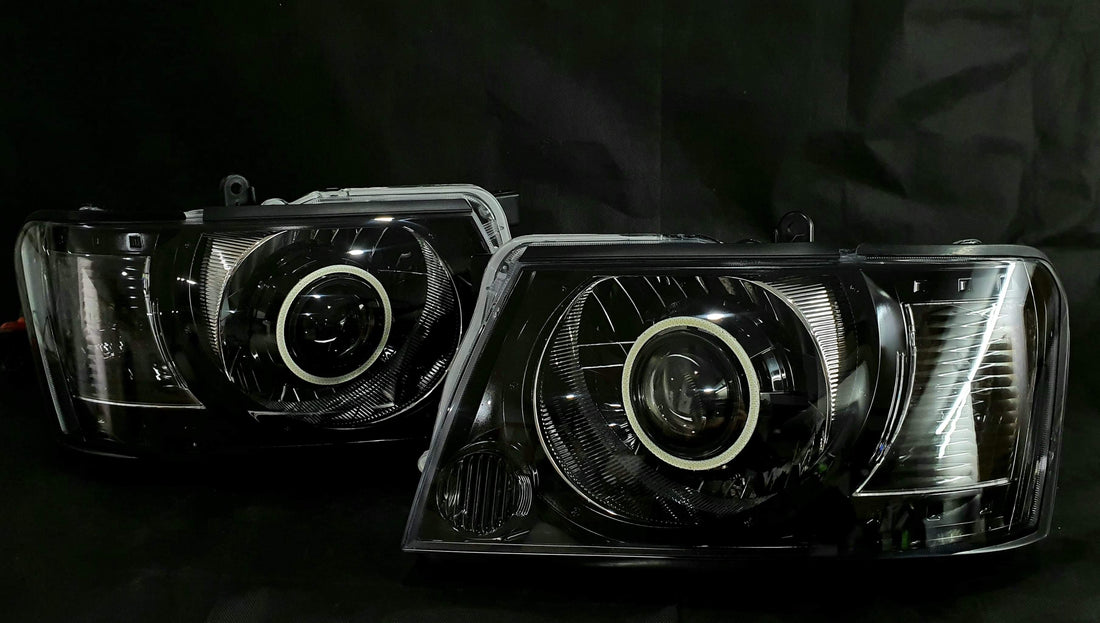 Nissan Patrol GU S4 Headlights with Multicoloured Halo Rings & Projector - Dan's Custom Car Lights