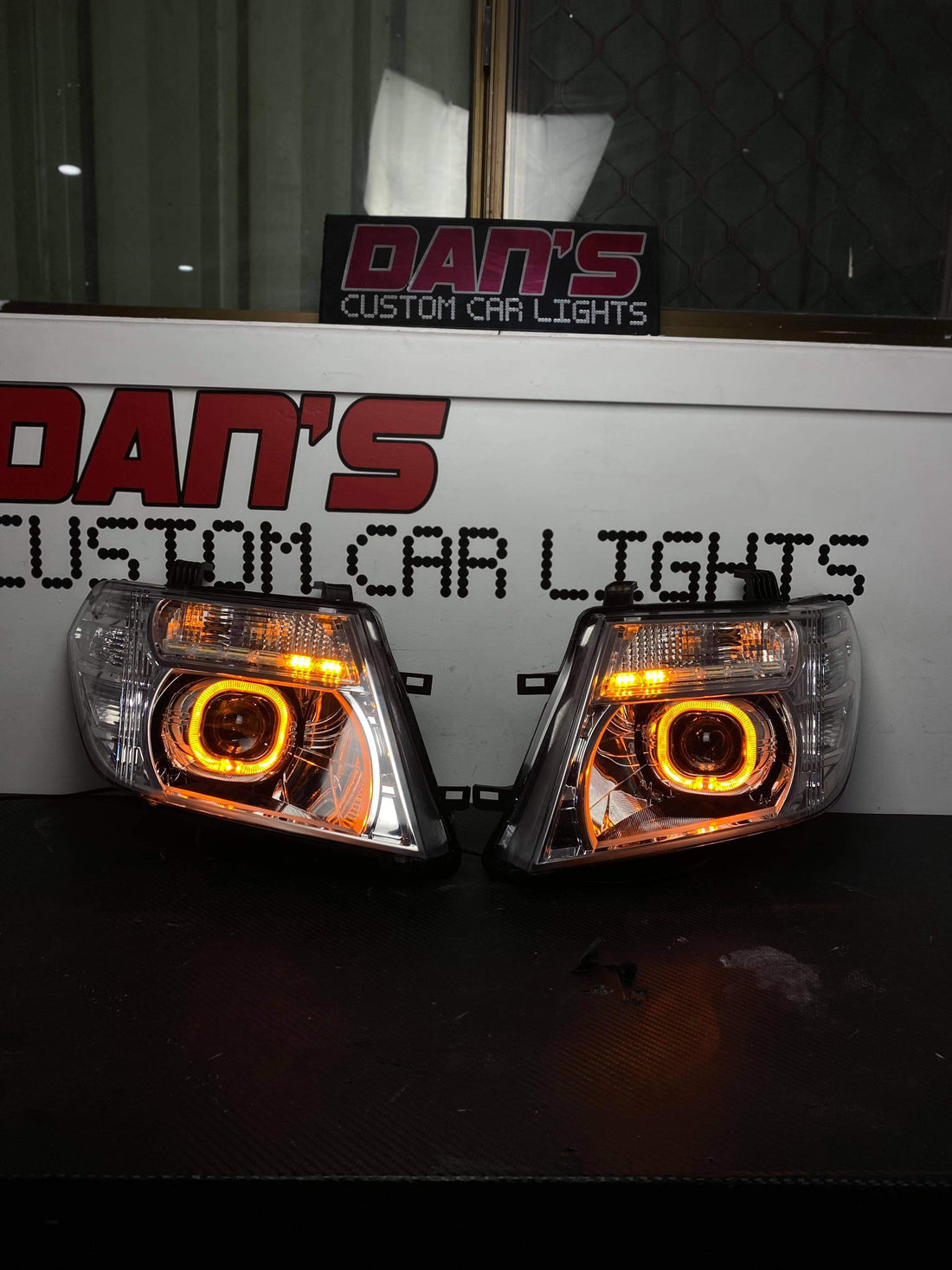 Nissan Navara D40 VSK Spain Facelift Chrome Headlights with White/Amber Halo Rings, DRLS and Projectors - Dan's Custom Car Lights
