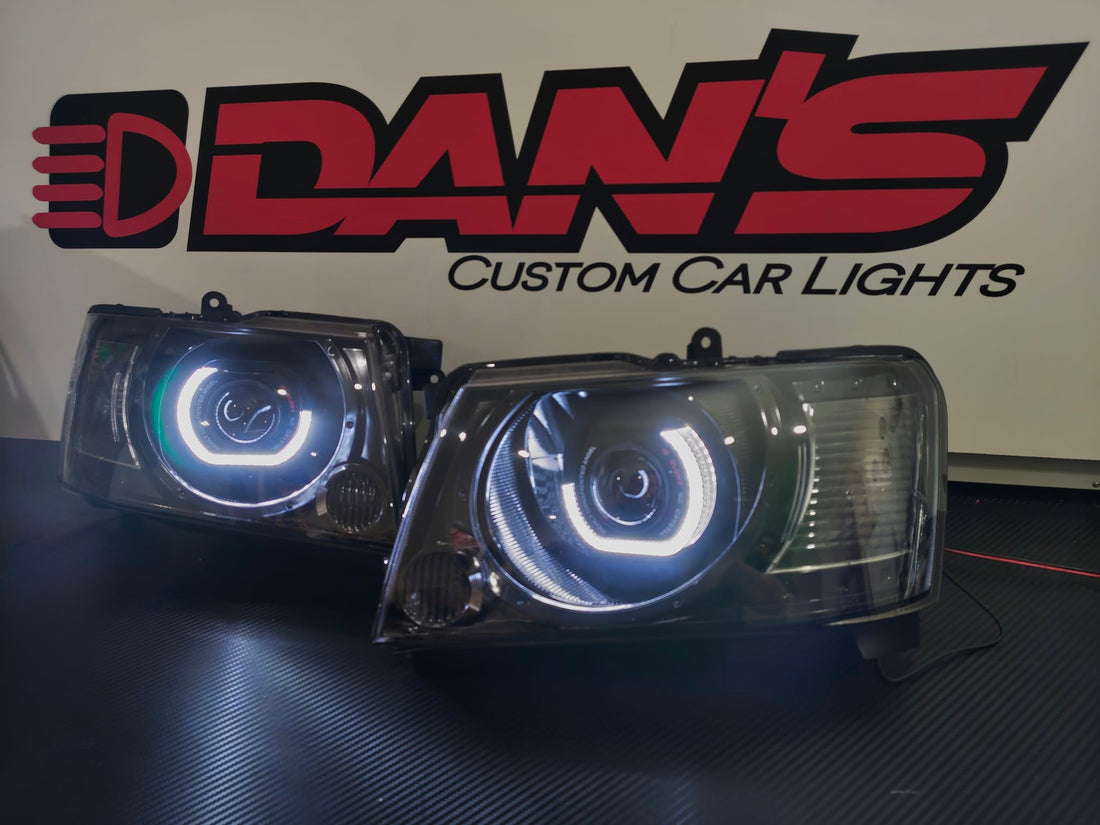 Nissan Patrol GU S4 Headlights with 5D White/Amber Halo Rings and Projectors - Dan's Custom Car Lights 