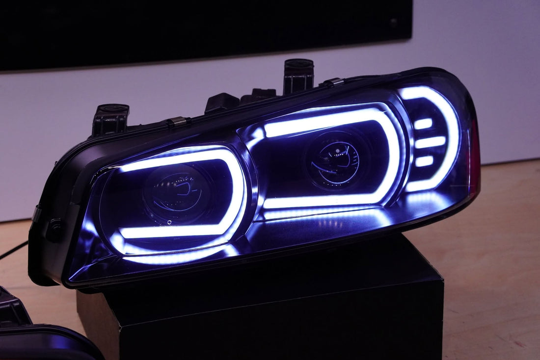 Genuine Nissan Skyline R34 GT & GT-T Headlights with White/Amber DRLs and Projectors