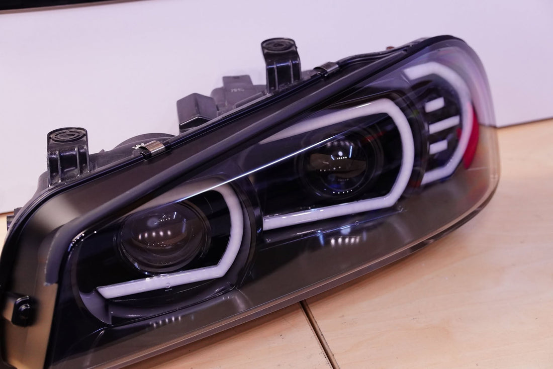 Genuine Nissan Skyline R34 GT & GT-T Headlights with White/Amber DRLs and Projectors