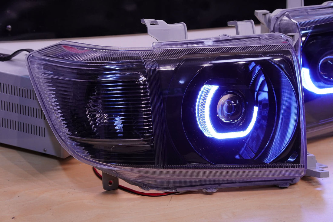 Toyota Landcruiser VDJ 70/76/78/79 series 2007-2019 Headlights with 5D White/Amber rings, Projectors and Blacking out