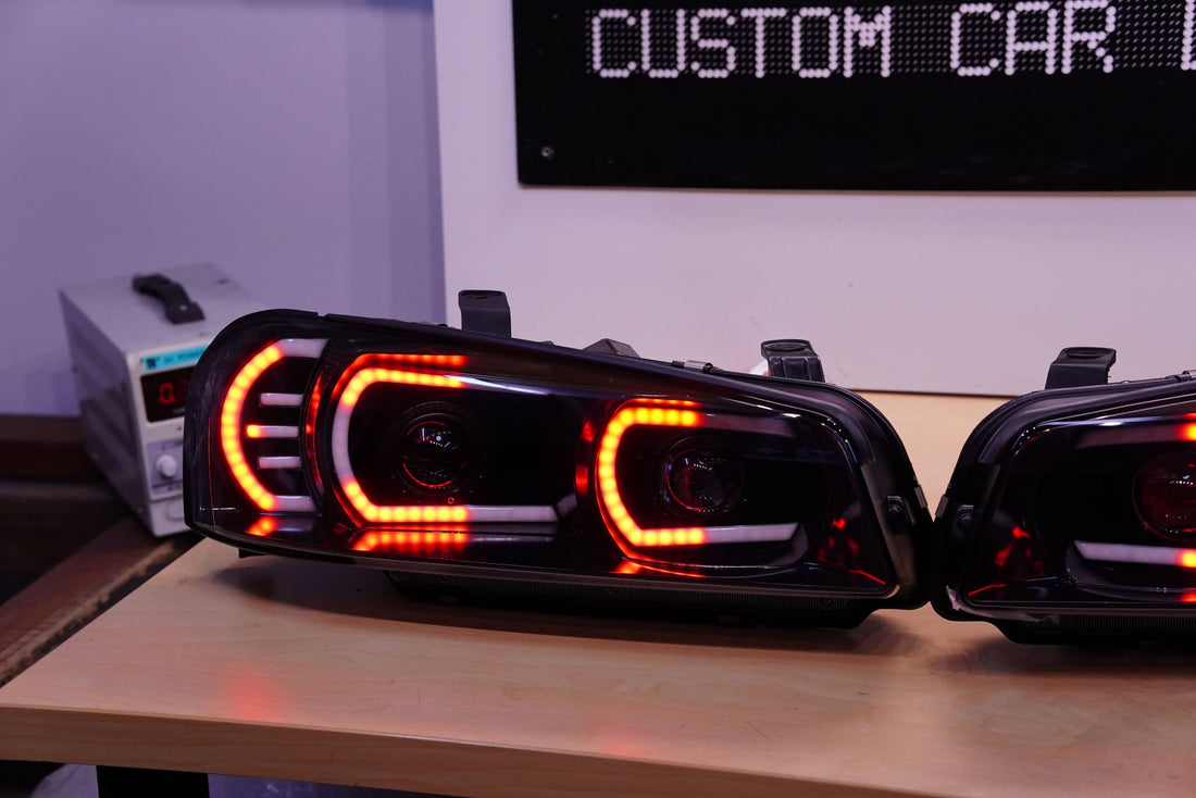 Genuine Nissan Skyline R34 GT & GT-T Headlights with Multicoloured Chasing DRLs and Projectors