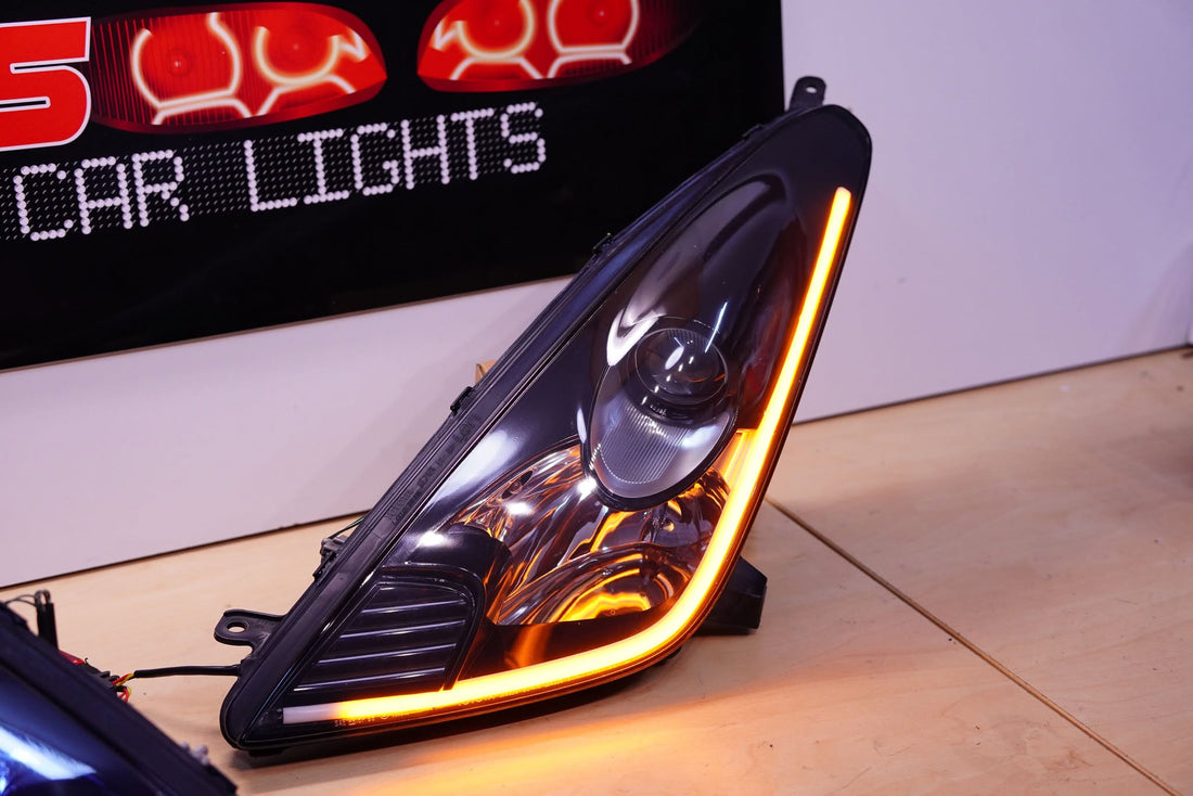 Toyota Celica 00-05 GT ST Base TRD Black Housing Projector Headlights with Sequential White/Amber LED DRL