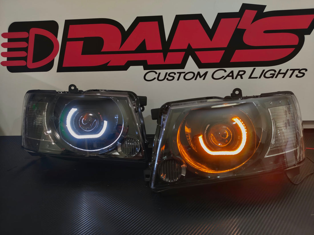Nissan Patrol GU S4 Headlights with 5D White/Amber Halo Rings and Projectors - Dan's Custom Car Lights 