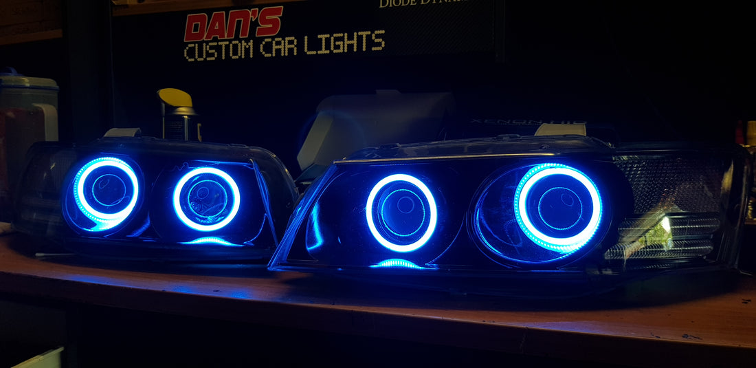 Holden VZ Commodore fitted with Quad Projectors and Multicolored Halo Ring - Dan's Custom Car Lights 