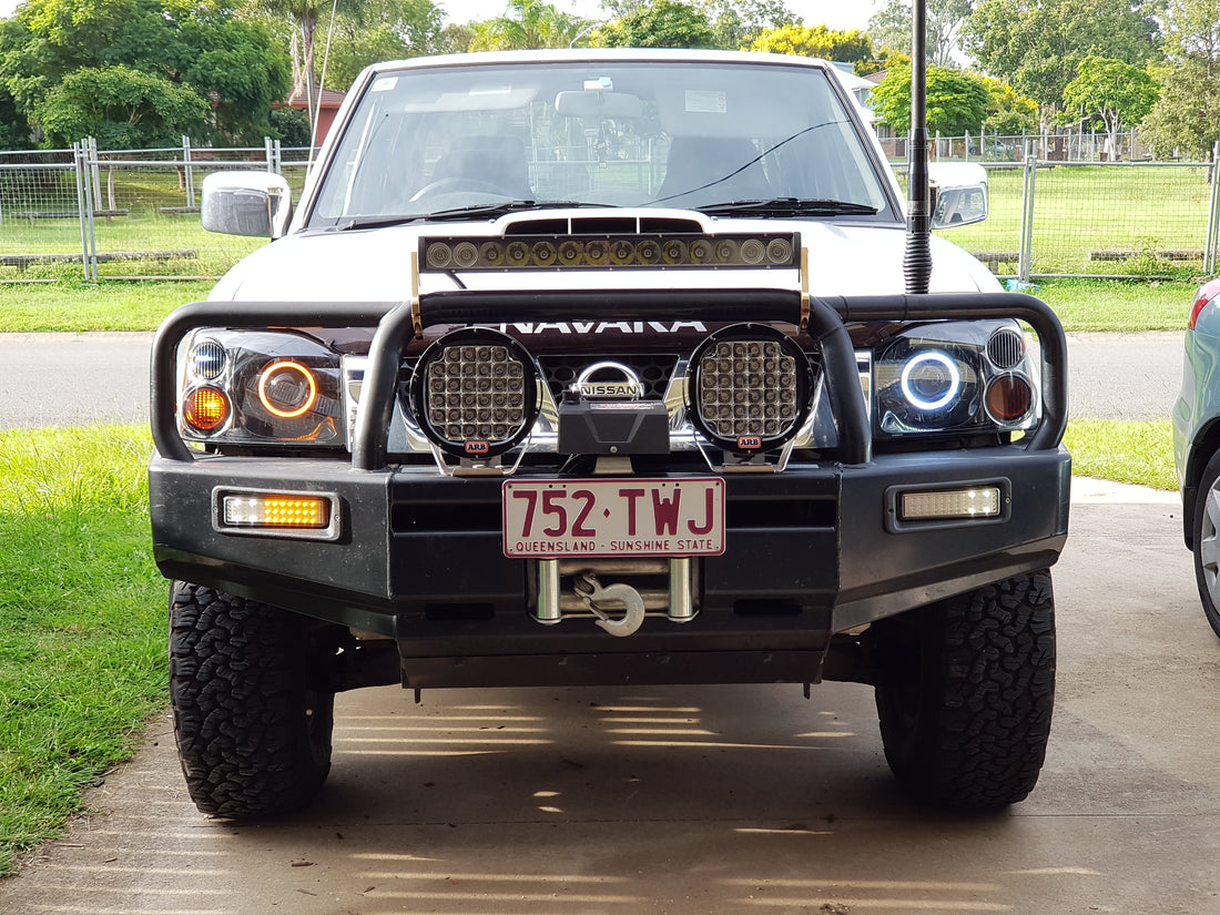 Nissan Navara D22 Headlights with White/Amber Halo Rings - Dan's Custom Car Lights 