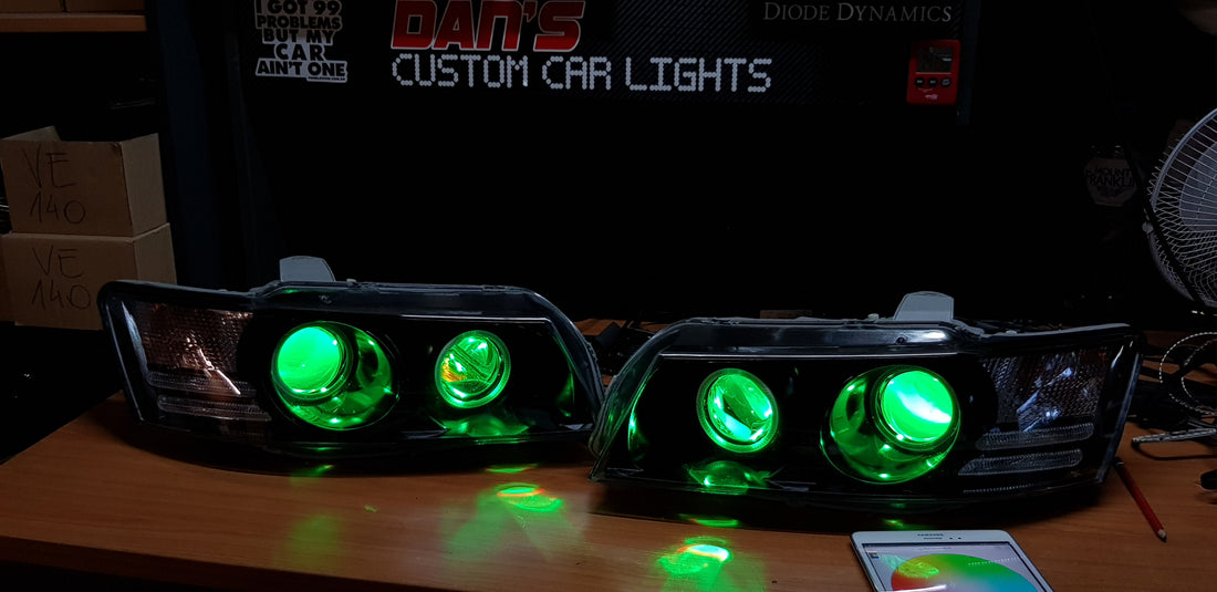 Holden VZ Commodore Projector Headlights with Multicolored Halo Rings and Demon Eyes - Dan's Custom Car Lights 