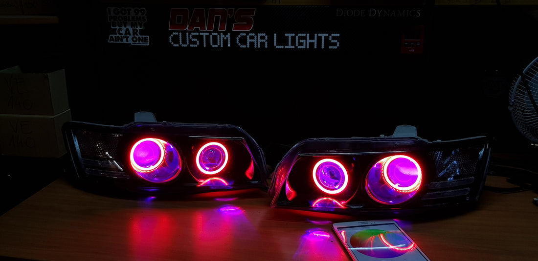 Holden VZ Commodore Projector Headlights with Multicolored Halo Rings and Demon Eyes - Dan's Custom Car Lights 