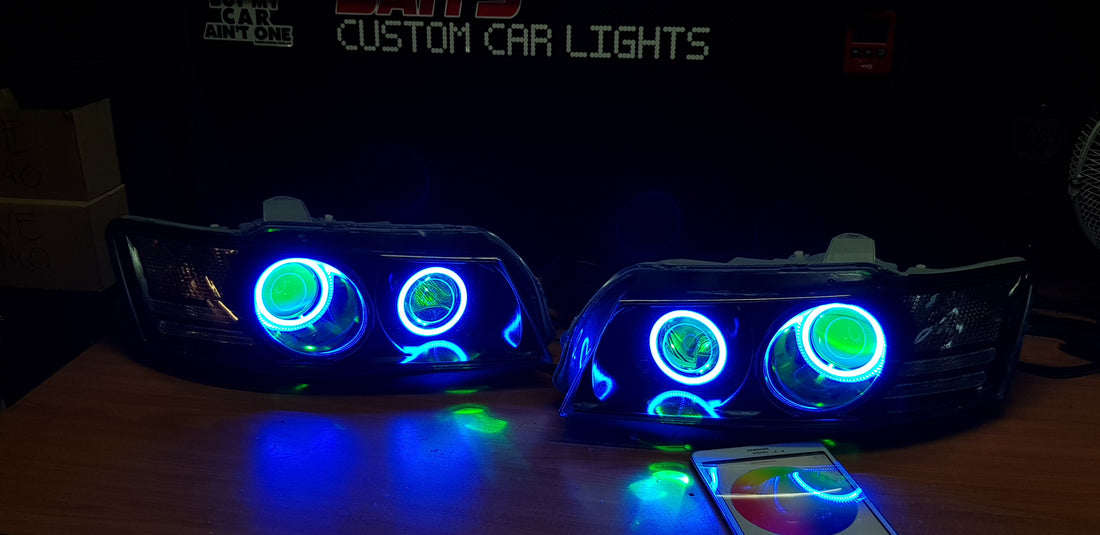 Holden VZ Commodore Projector Headlights with Multicolored Halo Rings and Demon Eyes - Dan's Custom Car Lights 