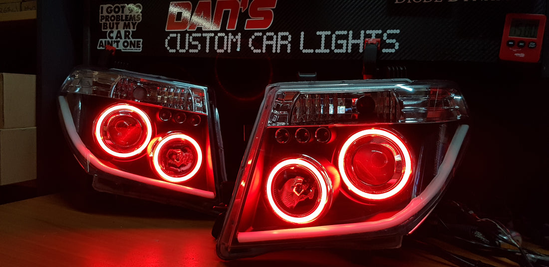 Nissan Navara D40 THAI Pathfinder Headlights with Quad Multicolored Halo Rings - Dan's Custom Car Lights 