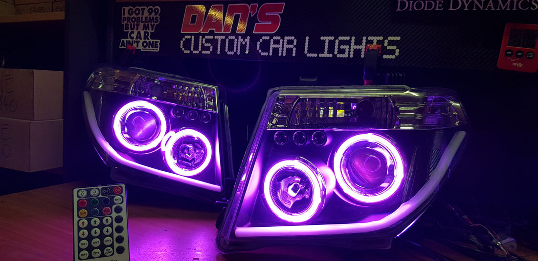 Nissan Navara D40 THAI Pathfinder Headlights with Quad Multicolored Halo Rings - Dan's Custom Car Lights 
