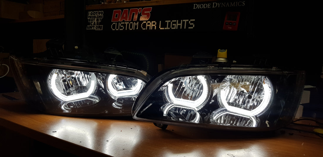 Holden VE Commodore S2 with White/Orange Halo Rings with optical cover and Custom LED Indicator - Dan's Custom Car Lights 