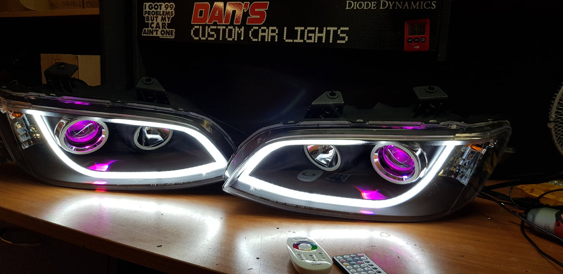 Holden VE Commodore S1/S2 DRL Style Headlights with Multicoloured Halo Rings and Demon Eyes - Dan's Custom Car Lights 