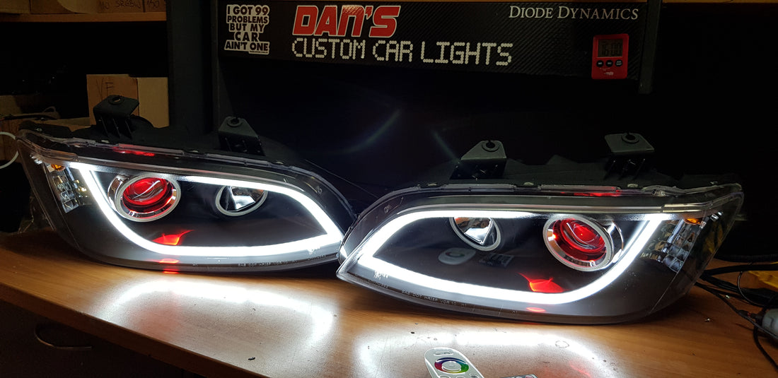 Holden VE Commodore S1/S2 DRL Style Headlights with Multicoloured Halo Rings and Demon Eyes - Dan's Custom Car Lights 